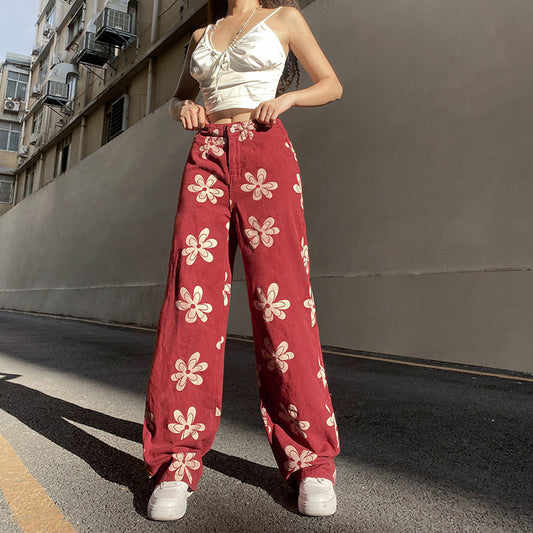 Low-rise floral print jeans