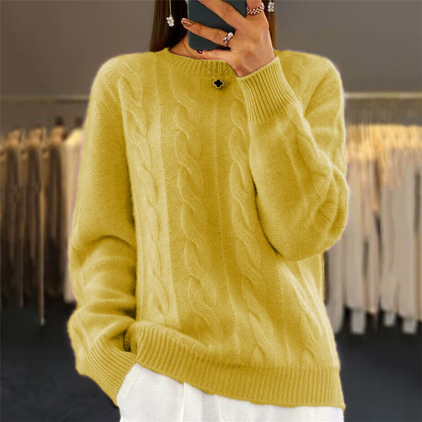Pull en tricot torsadé