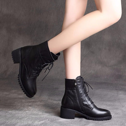 Bottes courtes à talons épais en cuir souple et velours